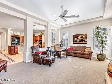 a bedroom with furniture and a chandelier