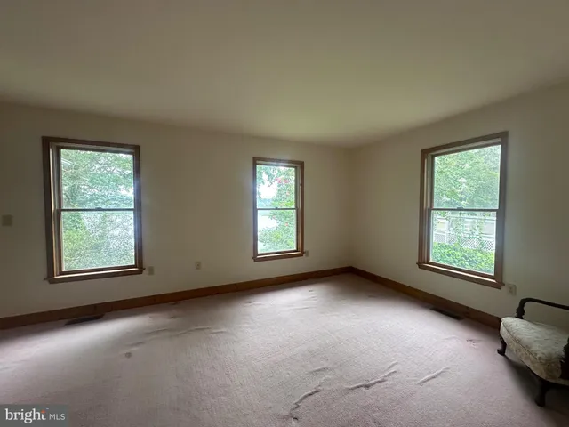 an empty room with windows