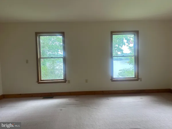 an empty room with a window