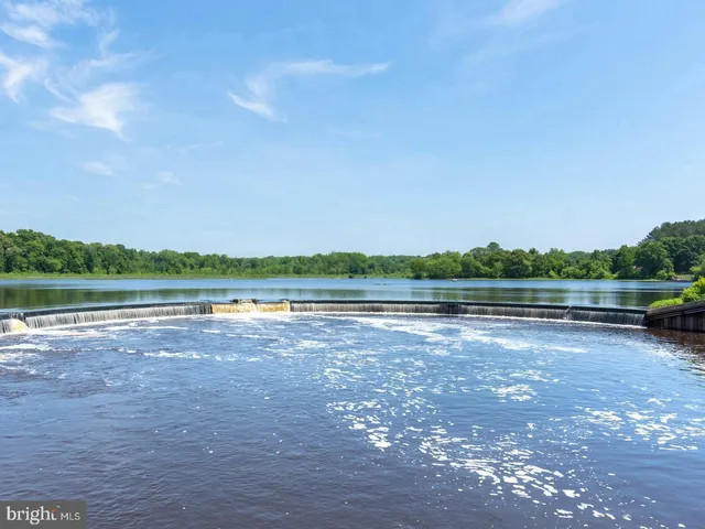 a view of lake with green space