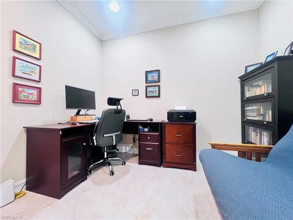 a bedroom with a bed and a table