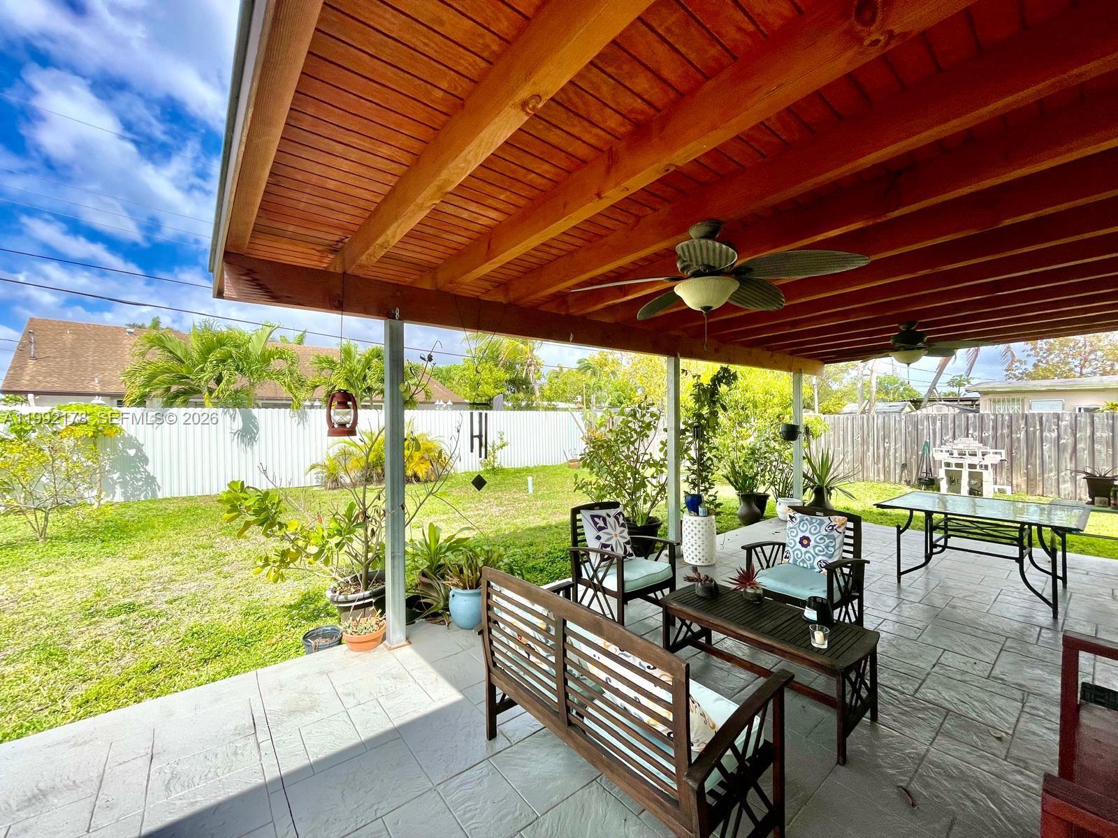 5820 Southwest 113th Court Miami, FL 33173 - Photo 2 of 22 a view of swimming pool with outdoor seating