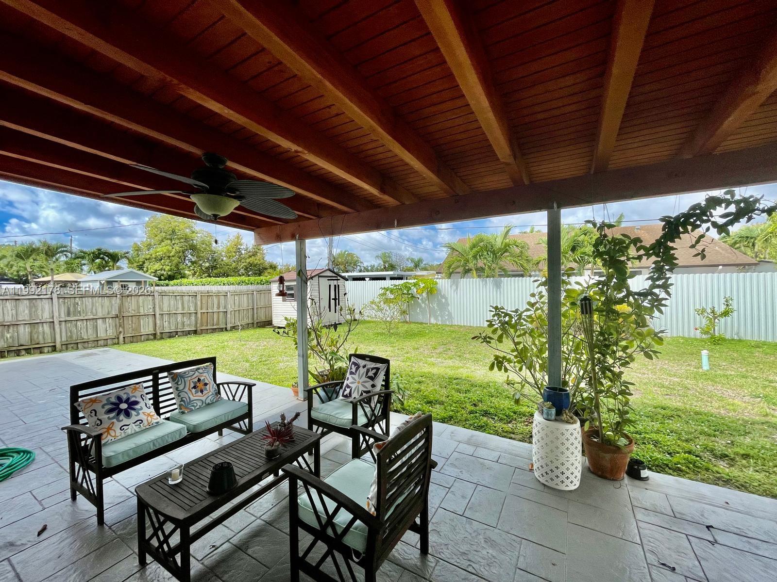 5820 Southwest 113th Court Miami, FL 33173 - Photo 21 of 22 a view of a two chair in the patio
