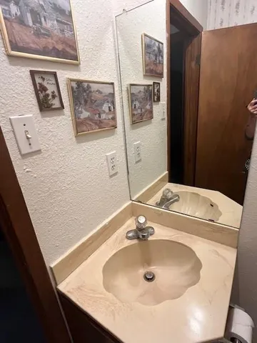 a view of room with racks on the wall