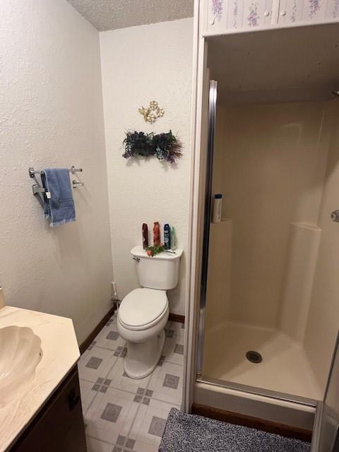 915 Highway 84 Mullin, TX 76864 - Photo 17 of 37 a bathroom with a toilet and a shower