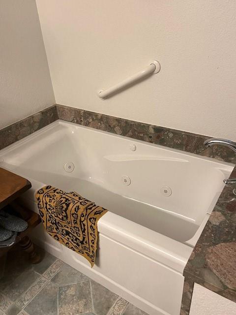 915 Highway 84 Mullin, TX 76864 - Photo 23 of 37 a bathroom with a bathtub and shower