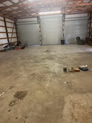 a view of a backyard of the house