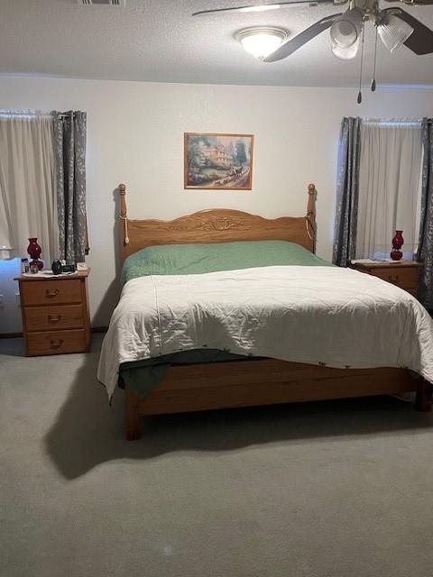 915 Highway 84 Mullin, TX 76864 - Photo 25 of 37 a bedroom with a bed and a dresser