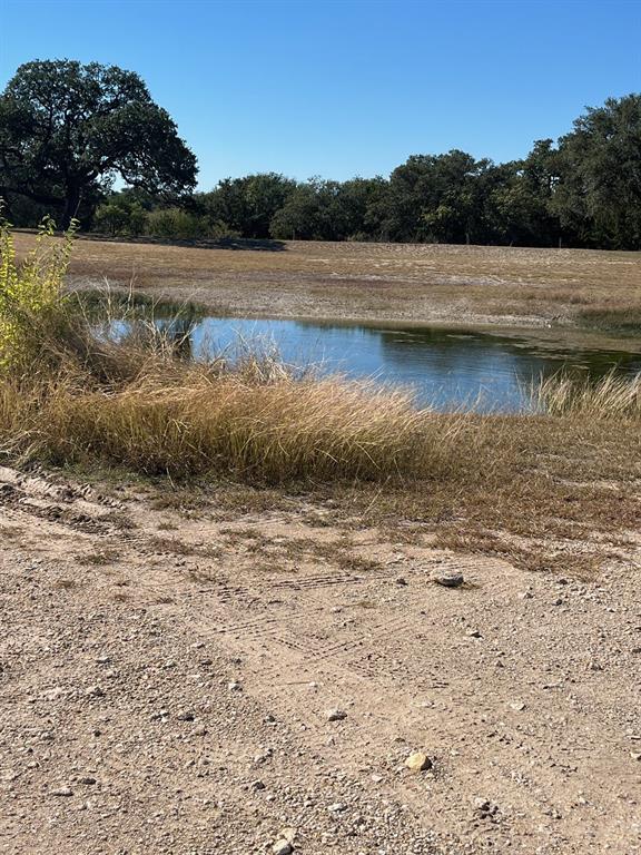 915 Highway 84 Mullin, TX 76864 - Photo 36 of 37 a view of lake with green space