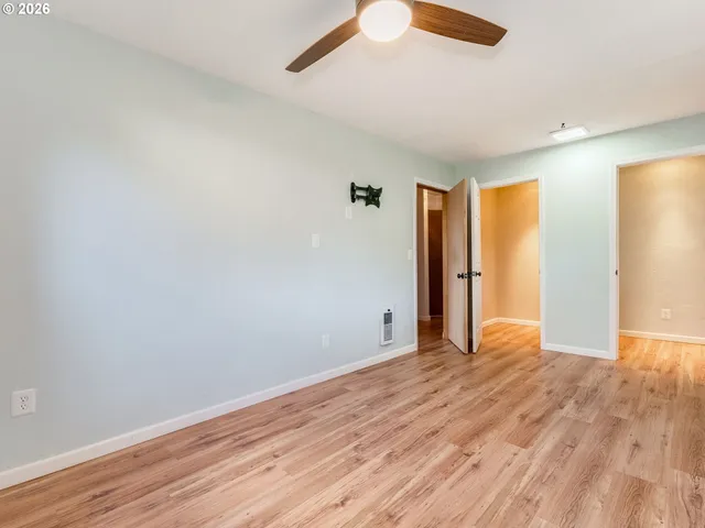 a view of a wooden balcony with outdoor space