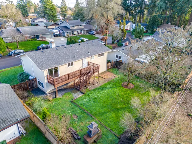 a view of a lake with a yard