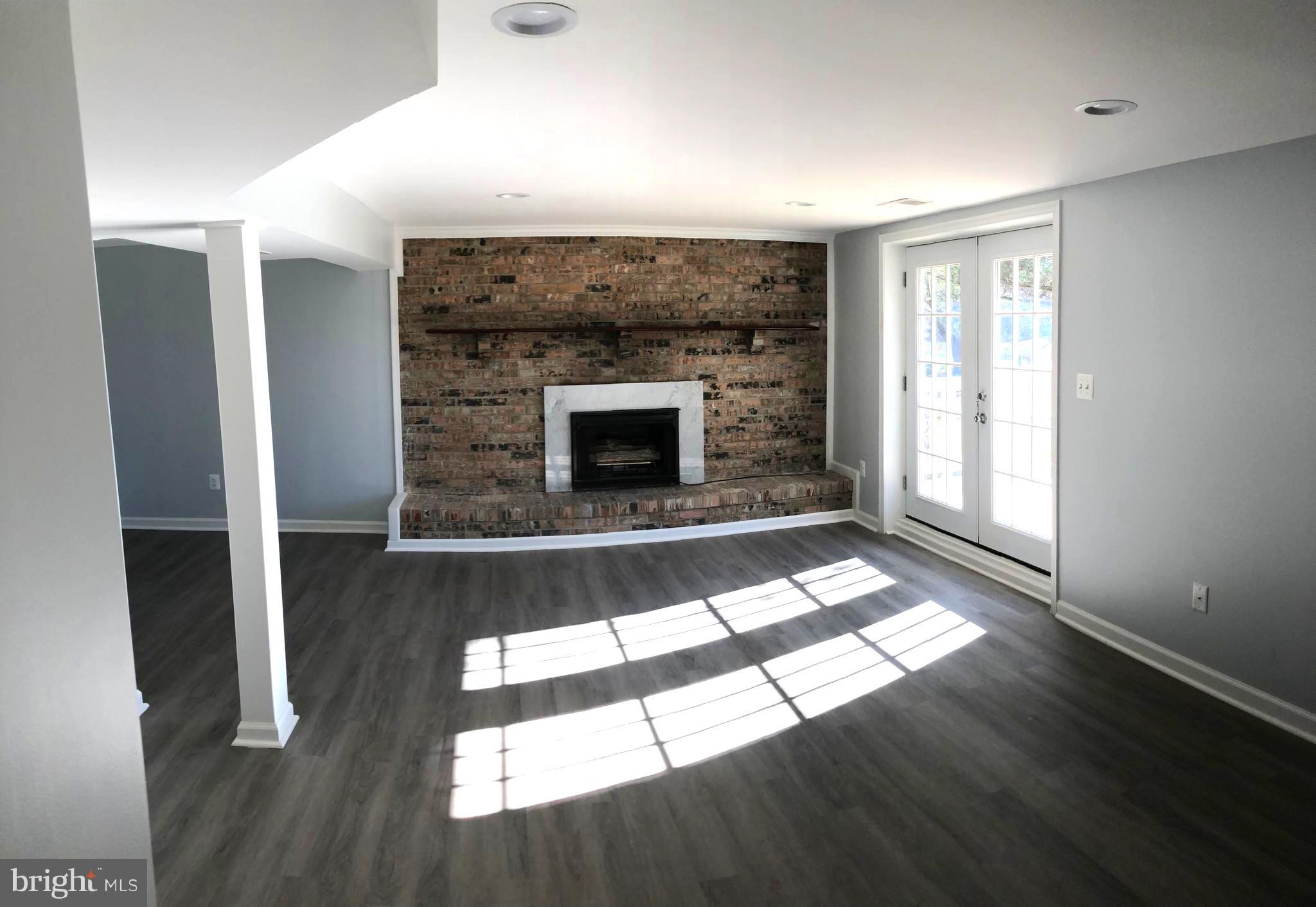 4503 Ebenezer Road Nottingham, MD 21236 - Photo 21 of 34 Family Room - LL 1 - Leading to large deck