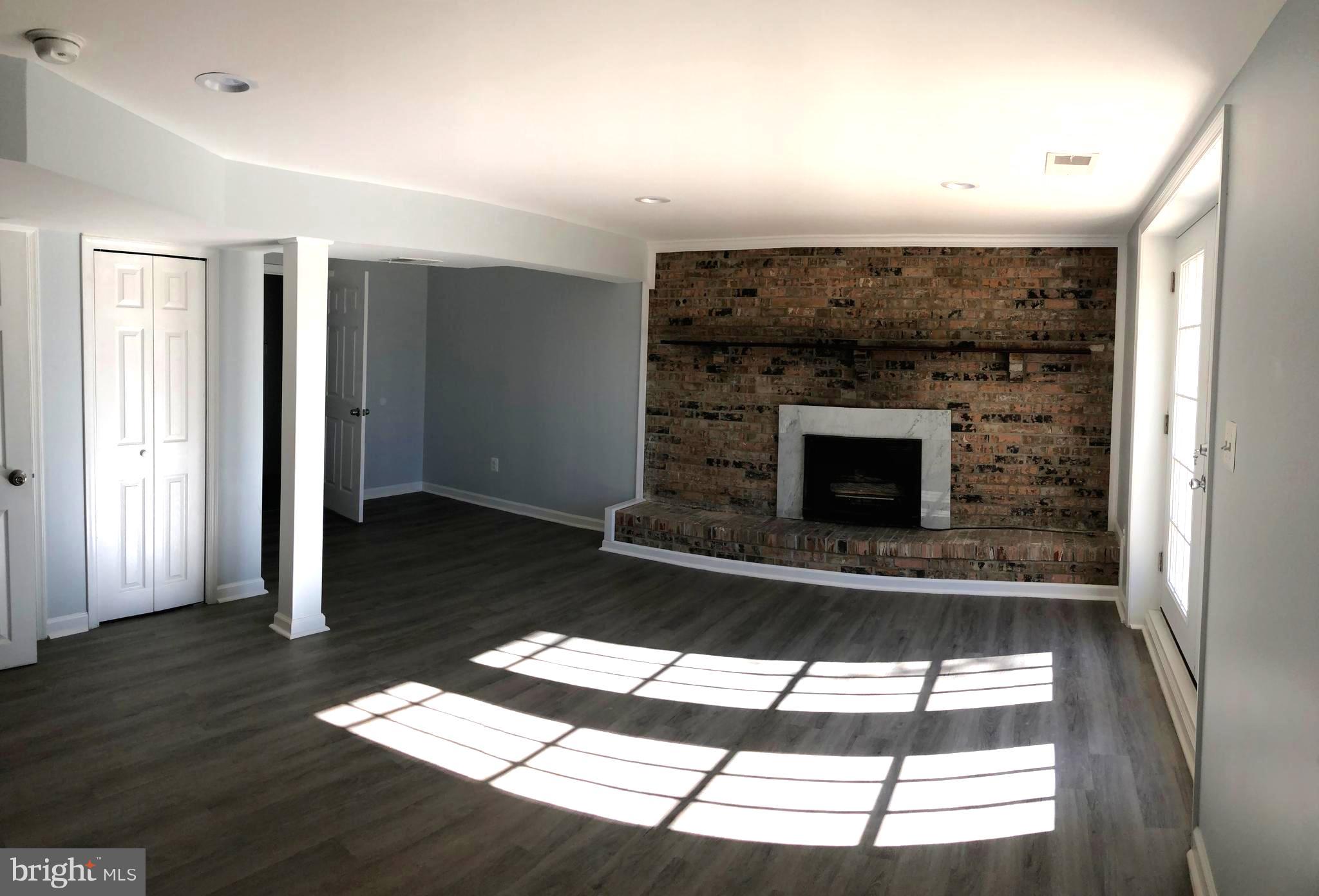 4503 Ebenezer Road Nottingham, MD 21236 - Photo 23 of 34 Family Room - Lower Level 1 with fireplace