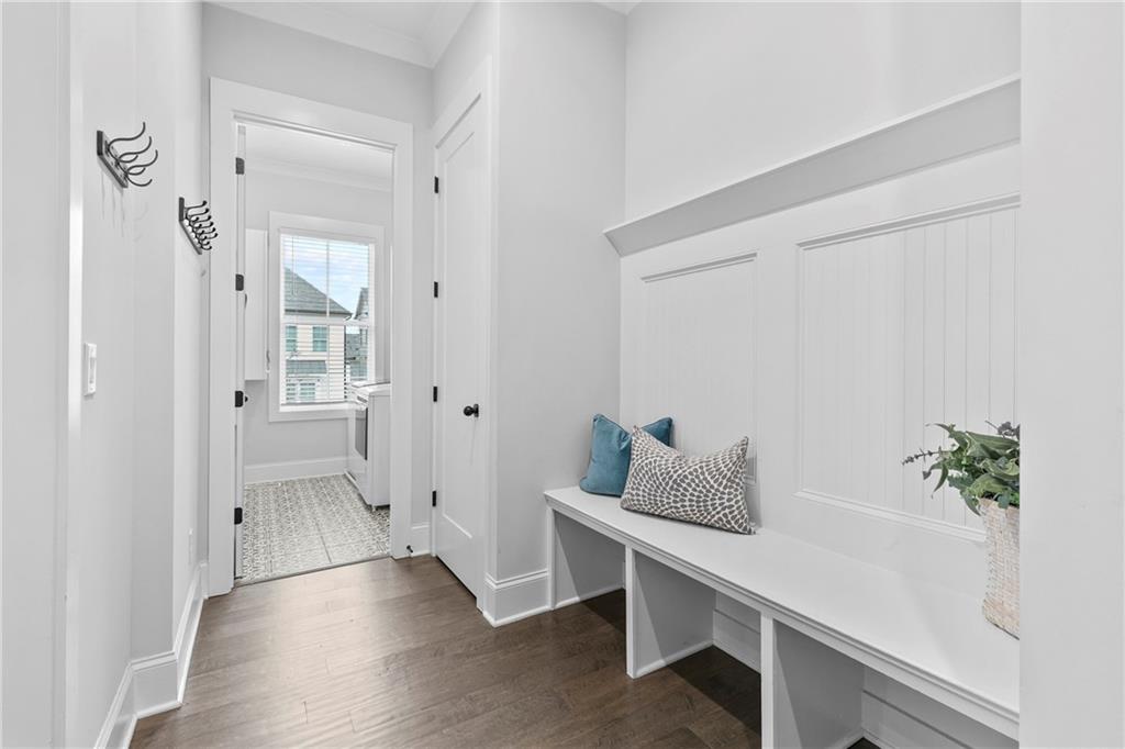 120 Meadow Mill Road Woodstock, GA 30188 - Photo 12 of 56 a view of an entryway with wooden floor