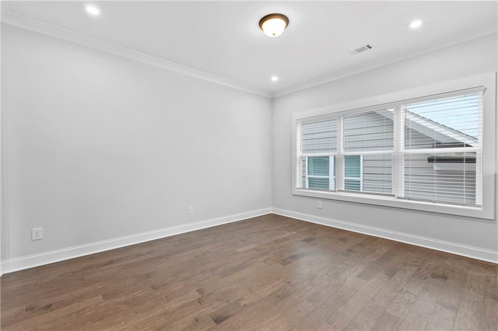 120 Meadow Mill Road Woodstock, GA 30188 - Photo 15 of 56 an empty room with a window