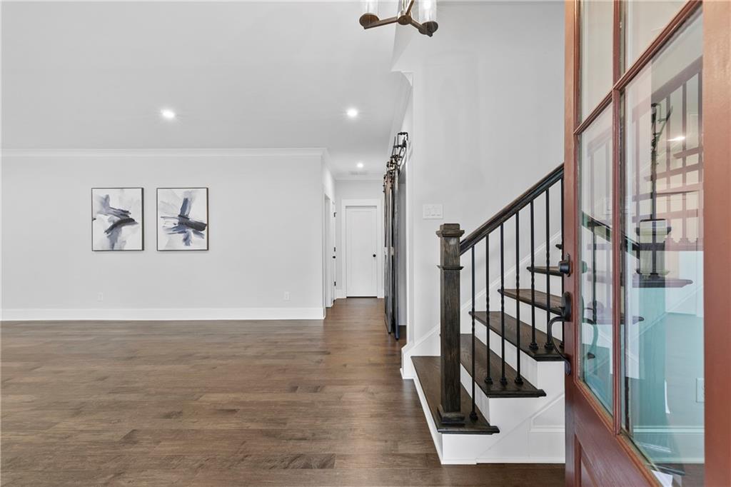 120 Meadow Mill Road Woodstock, GA 30188 - Photo 25 of 56 a view of an entryway with wooden floor