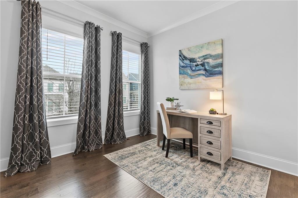 120 Meadow Mill Road Woodstock, GA 30188 - Photo 31 of 56 a workspace with furniture and a window