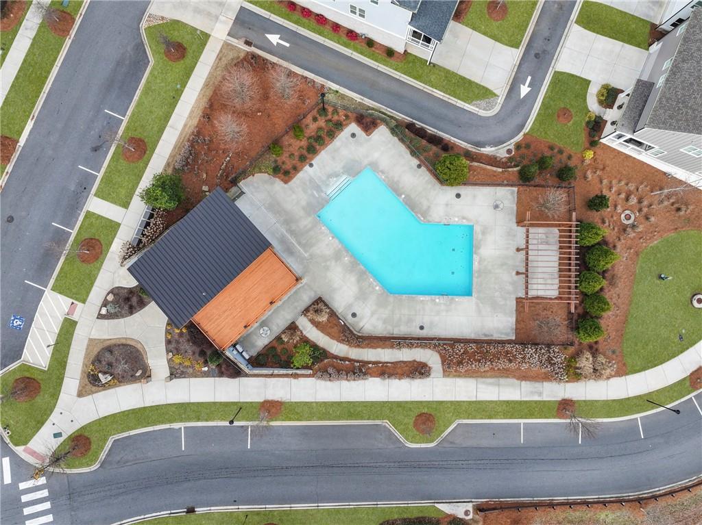 120 Meadow Mill Road Woodstock, GA 30188 - Photo 38 of 56 an aerial view of a house with a swimming pool