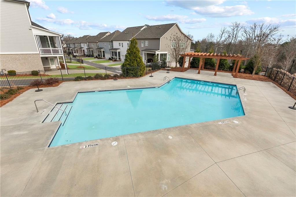 120 Meadow Mill Road Woodstock, GA 30188 - Photo 39 of 56 a view of a street with houses