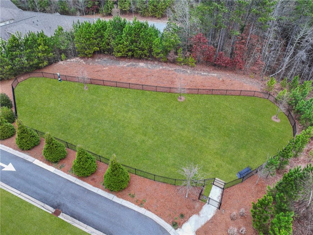 120 Meadow Mill Road Woodstock, GA 30188 - Photo 49 of 56 a view of a backyard with potted plants