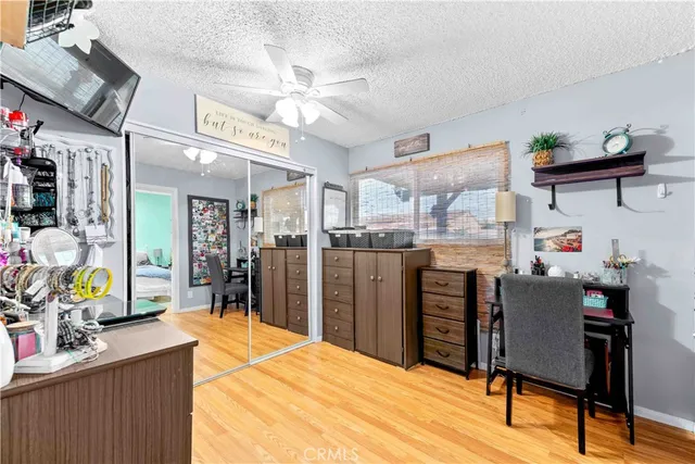 a room with stainless steel appliances kitchen island granite countertop furniture and a kitchen view