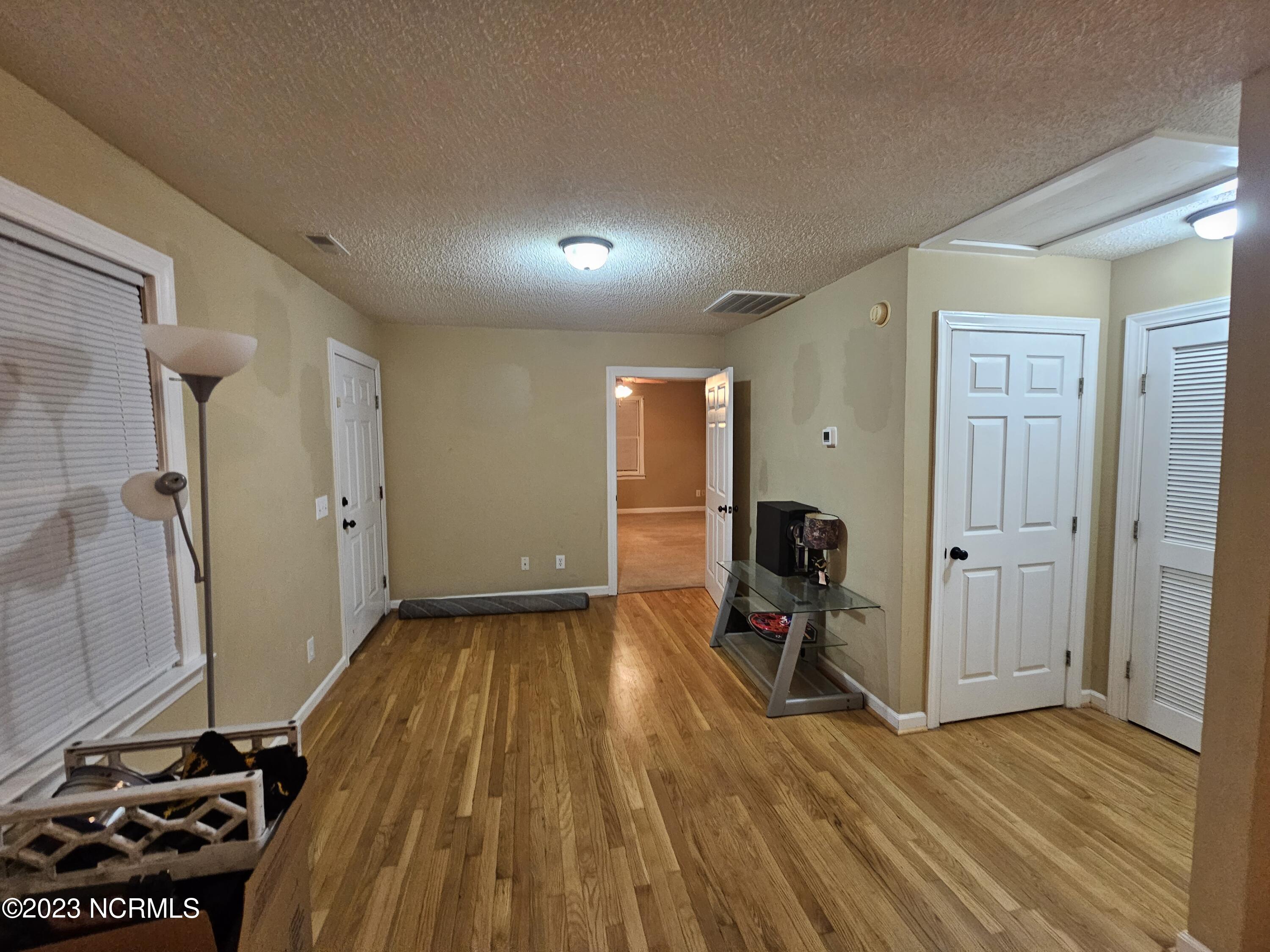 1752 Garner Road Greenville, NC 27834 - Photo 19 of 22 Guest Living Room