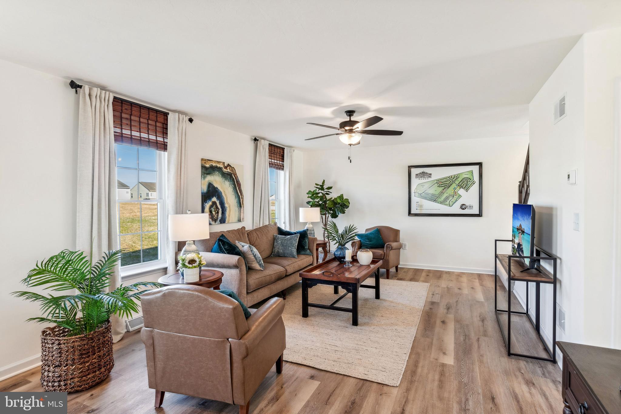 2601 Village Road Dover, PA 17315 - Photo 8 of 20 a living room with furniture and a wooden floor
