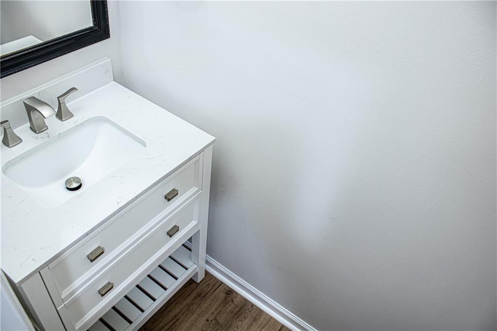 1962 Village Parkway Smyrna, GA 30080 - Photo 23 of 55 a bathroom with a sink and a mirror