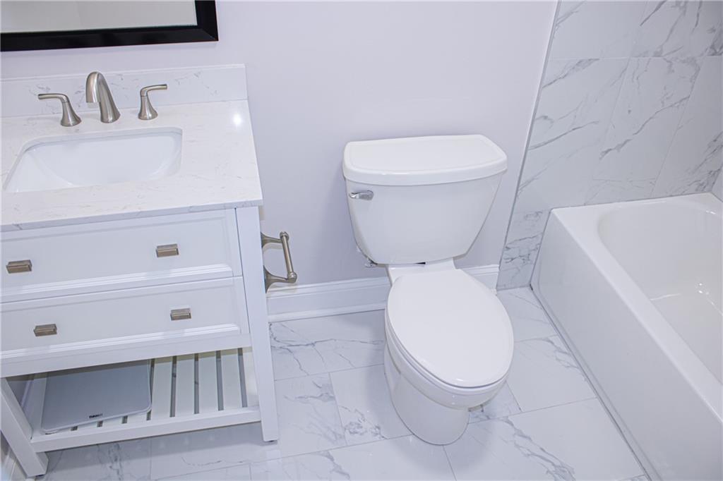 1962 Village Parkway Smyrna, GA 30080 - Photo 38 of 55 a bathroom with a toilet and a sink