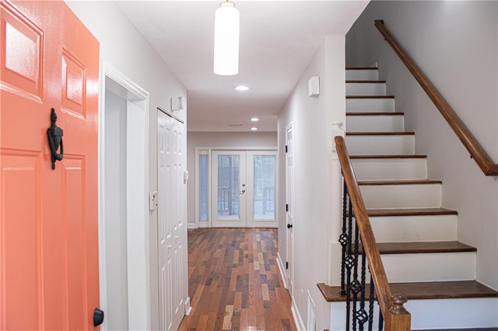 1962 Village Parkway Smyrna, GA 30080 - Photo 4 of 55 a view of entryway with wooden floor and stairs