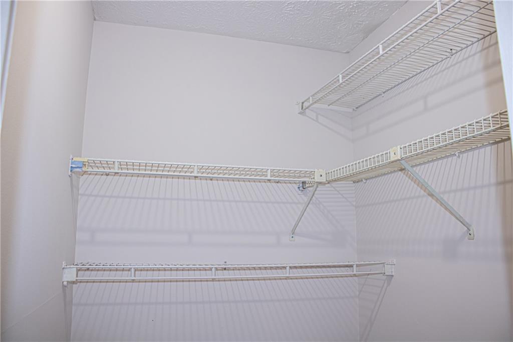 1962 Village Parkway Smyrna, GA 30080 - Photo 44 of 55 a view of a room with racks on the wall