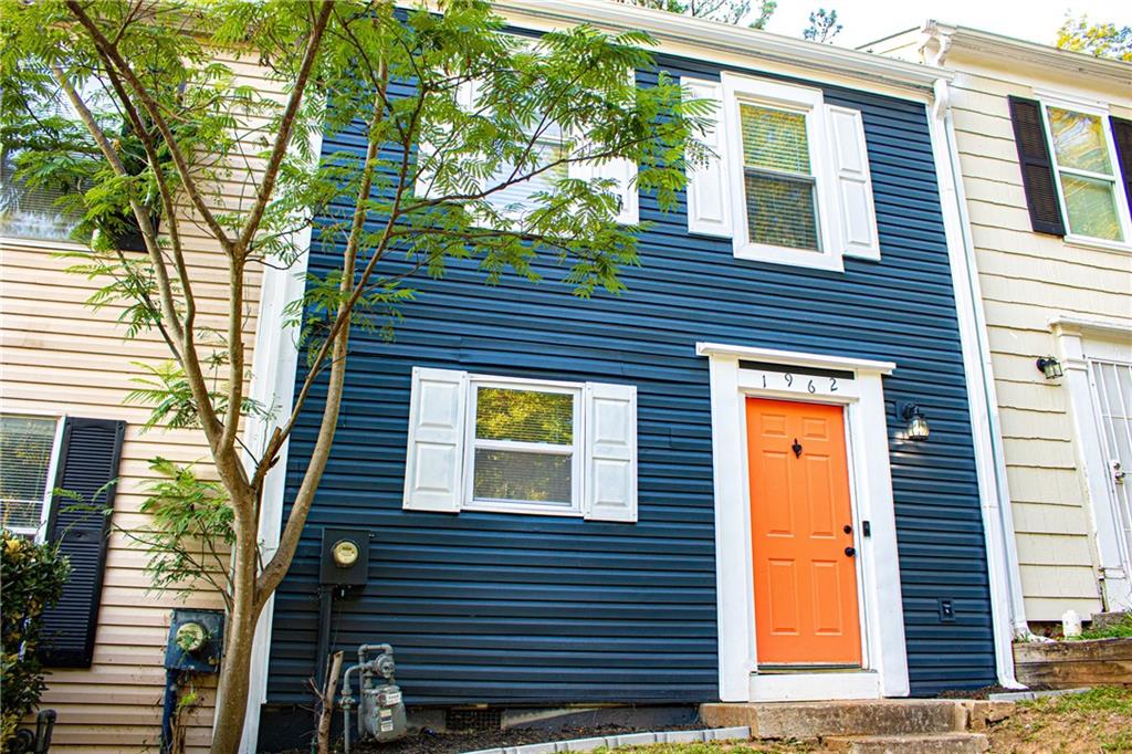 1962 Village Parkway Smyrna, GA 30080 - Photo 52 of 55 a view of a house with a door and wooden walls