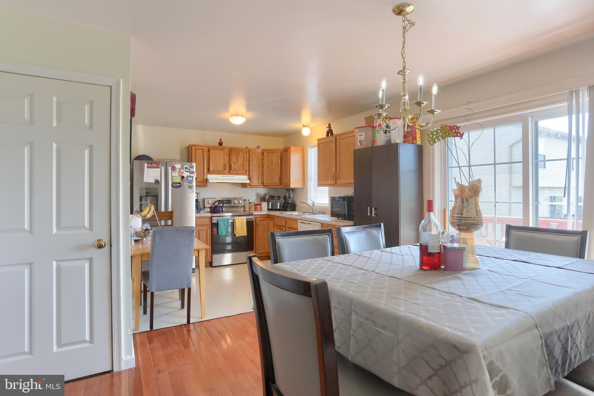187 South 21st Street Lebanon, PA 17042 - Photo 11 of 31 a dining room with stainless steel appliances furniture a window and kitchen view