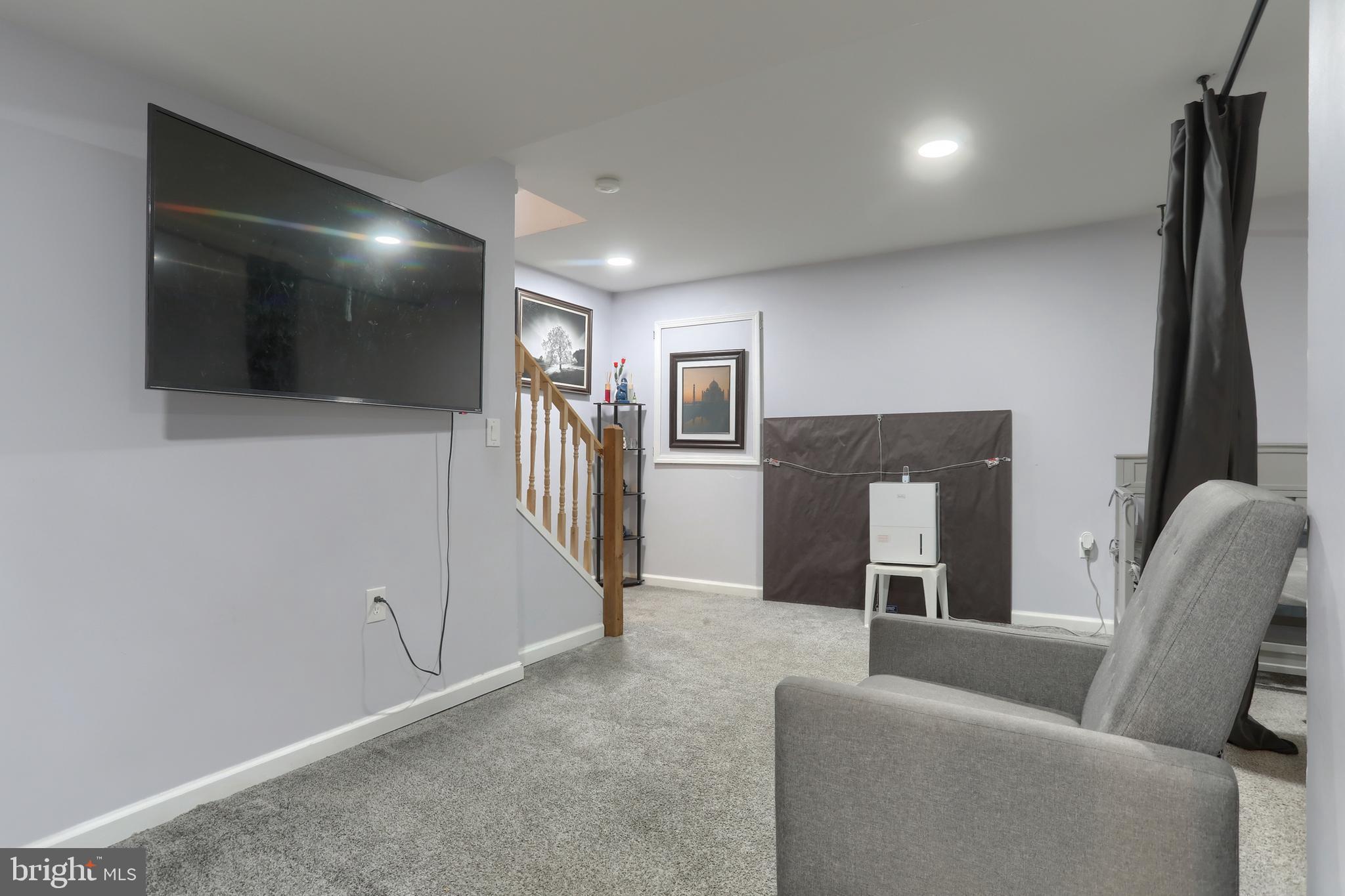 187 South 21st Street Lebanon, PA 17042 - Photo 24 of 31 a living room with furniture and a flat screen tv
