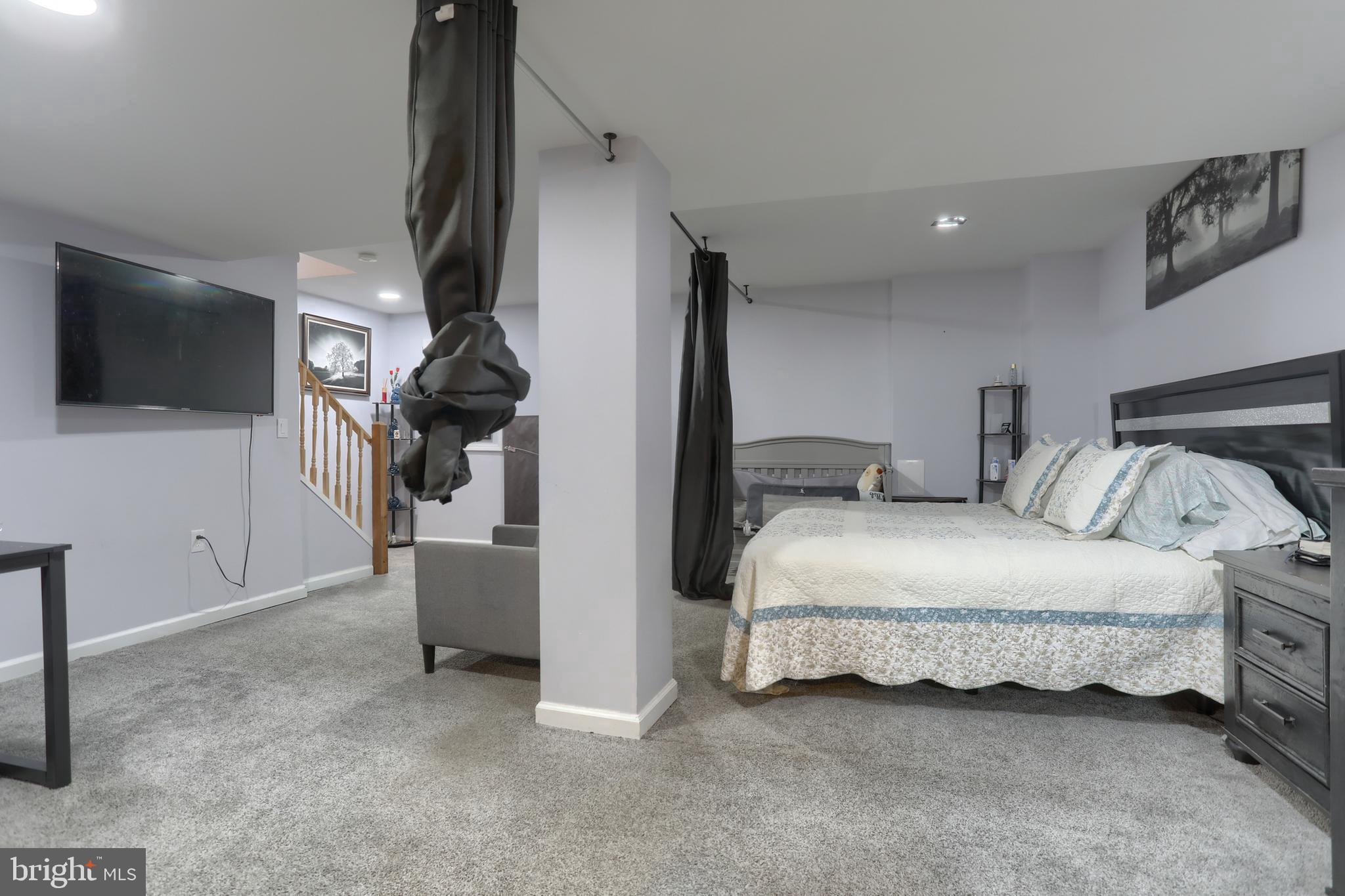 187 South 21st Street Lebanon, PA 17042 - Photo 25 of 31 a bedroom with a bed and a television