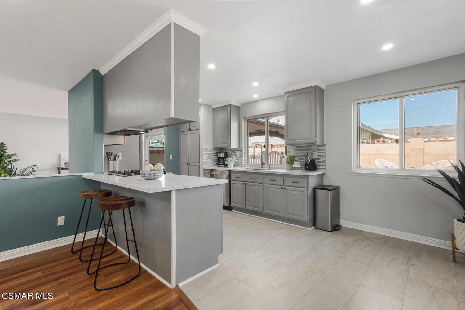 1735 Fitzgerald Road Simi Valley, CA 93065 - Photo 14 of 27 a kitchen with sink cabinets and window