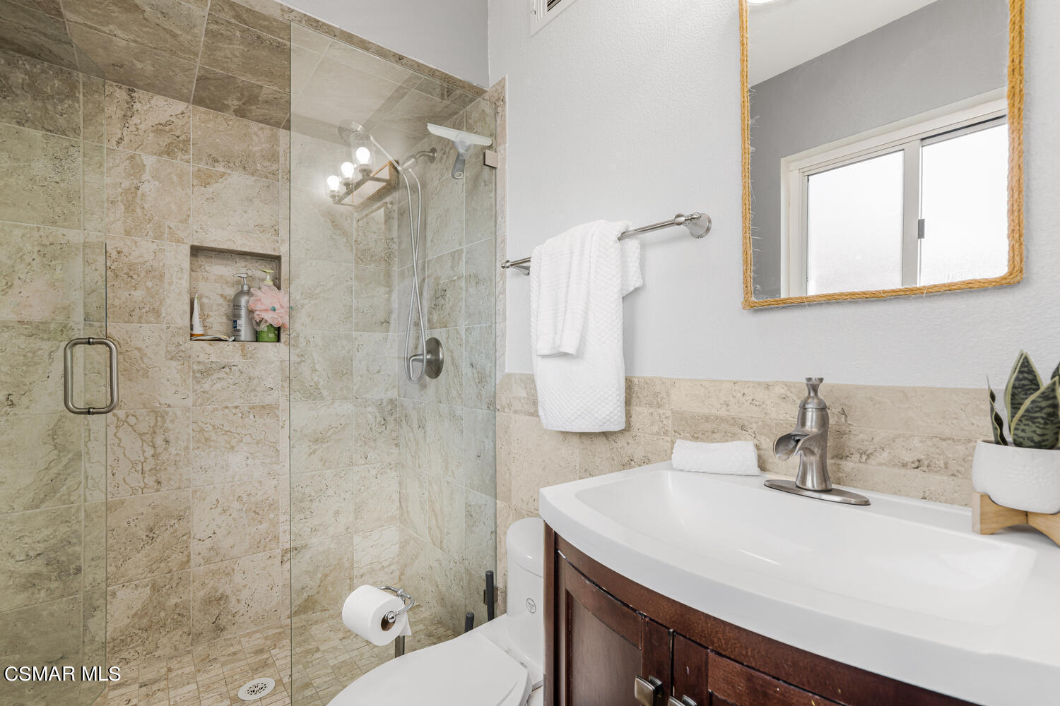 1735 Fitzgerald Road Simi Valley, CA 93065 - Photo 17 of 27 a bathroom with a sink a toilet and shower
