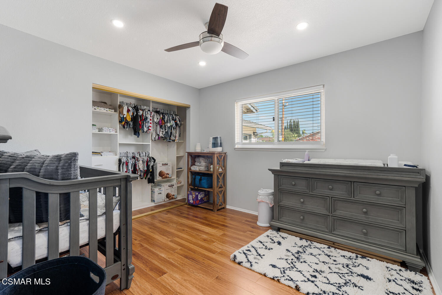 1735 Fitzgerald Road Simi Valley, CA 93065 - Photo 18 of 27 a room with furniture and wooden floor