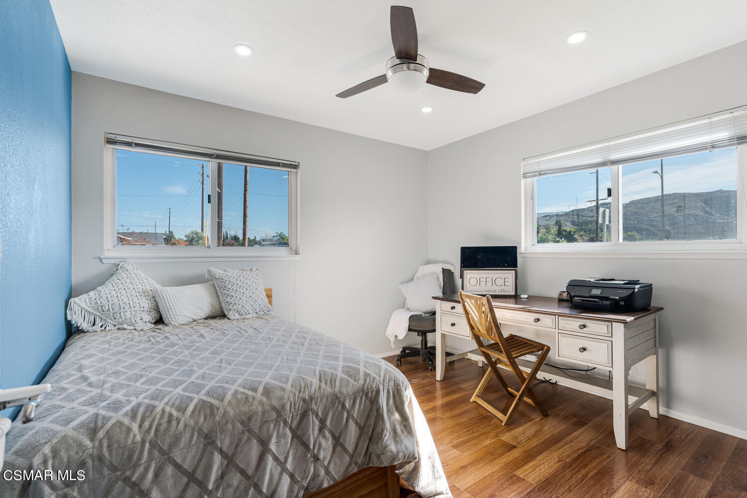 1735 Fitzgerald Road Simi Valley, CA 93065 - Photo 19 of 27 a bedroom with a bed and a table in it