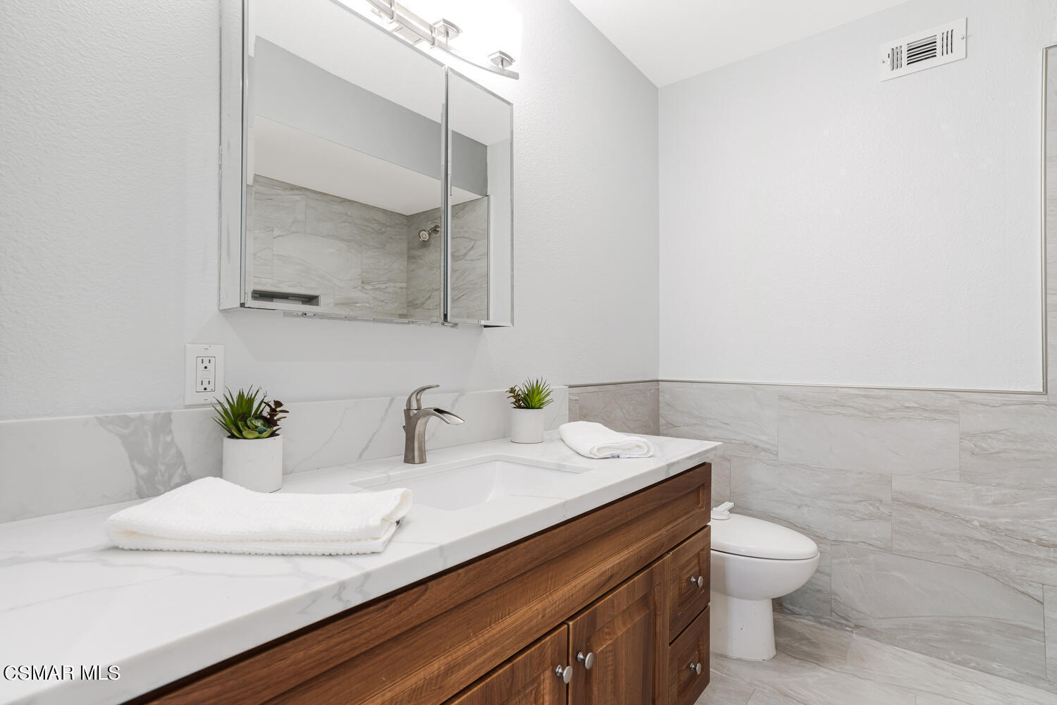 1735 Fitzgerald Road Simi Valley, CA 93065 - Photo 20 of 27 a bathroom with a sink and a toilet