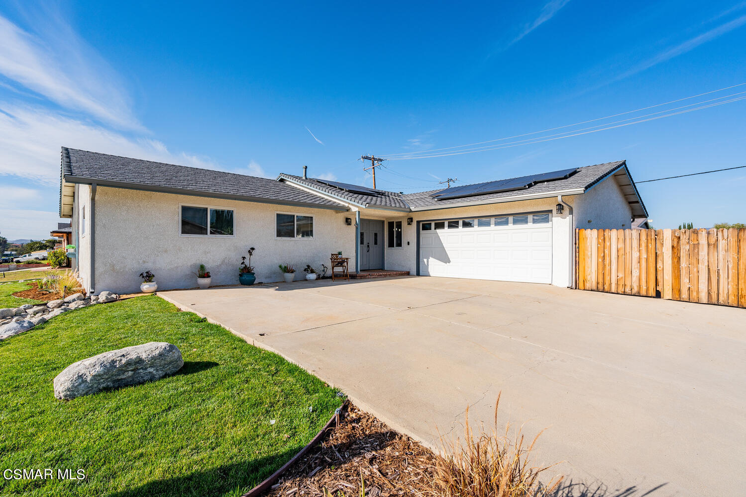 1735 Fitzgerald Road Simi Valley, CA 93065 - Photo 2 of 27 a front view of a house with garden