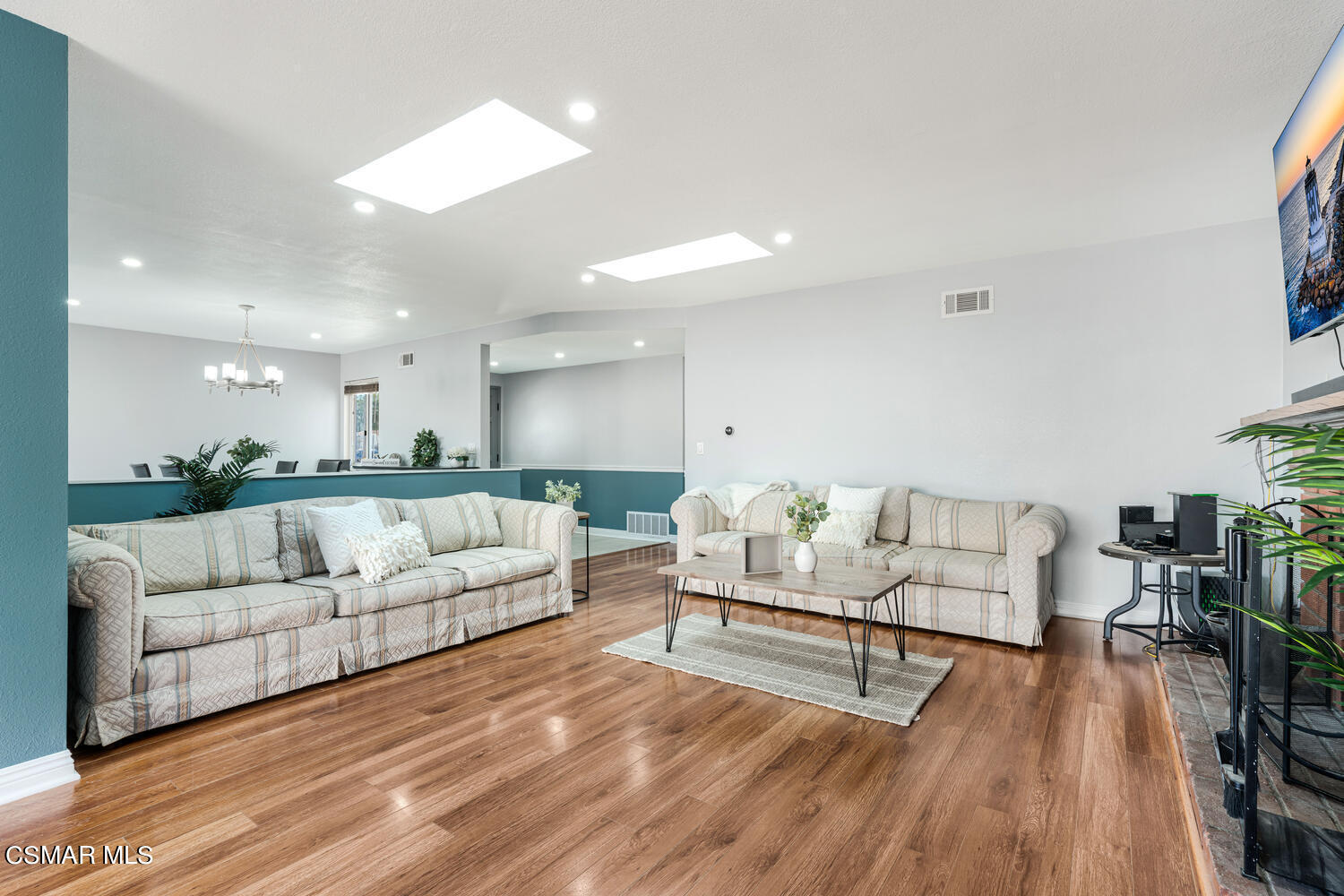 1735 Fitzgerald Road Simi Valley, CA 93065 - Photo 4 of 27 a living room with furniture and a wooden floor