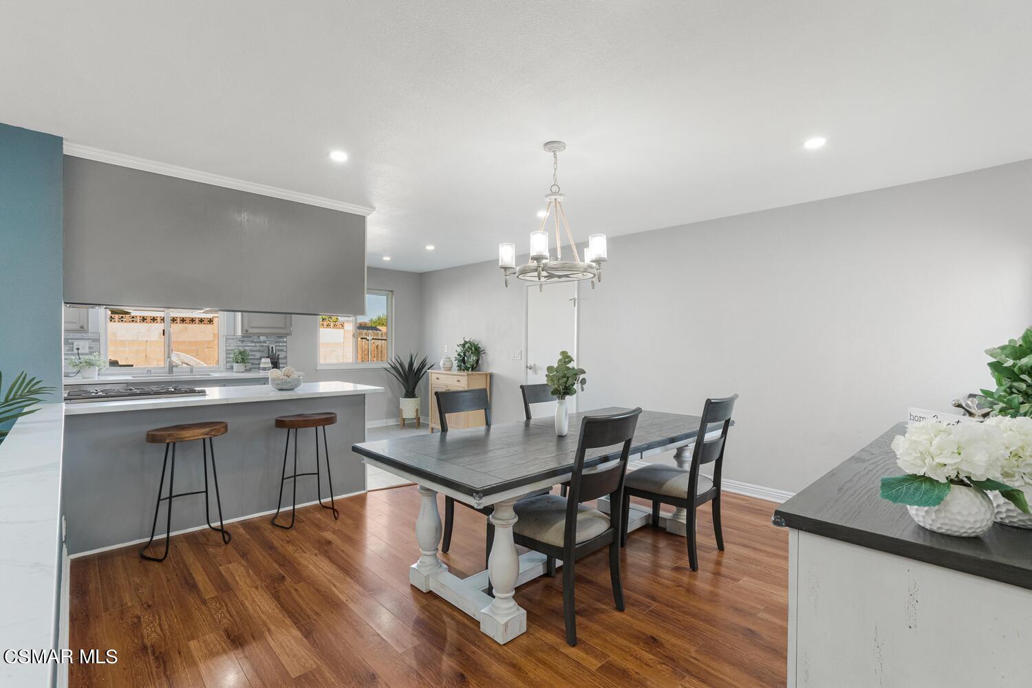 1735 Fitzgerald Road Simi Valley, CA 93065 - Photo 7 of 27 a view of a dining room with furniture and chandelier