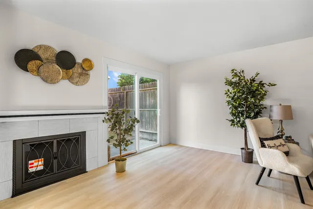 a workspace with furniture and a fireplace