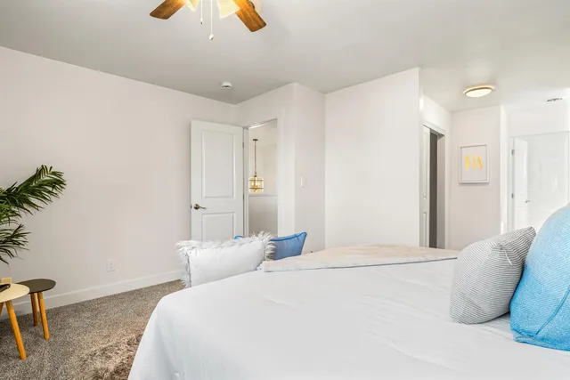 a view of a bathroom with a shower and a sink