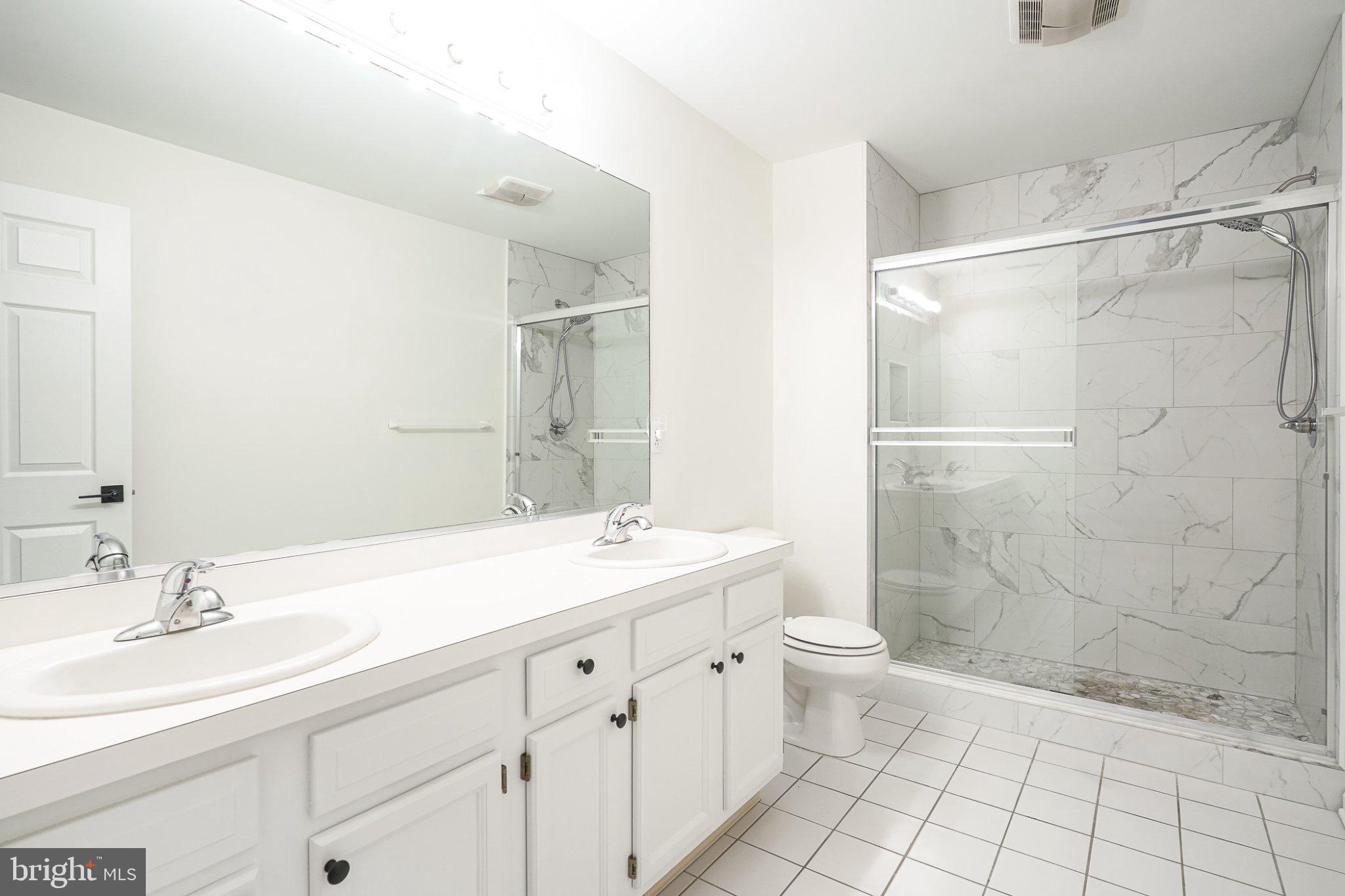 8 Trout Trail Delran, NJ 08075 - Photo 20 of 33 Sleek modern bathroom with marble accents.