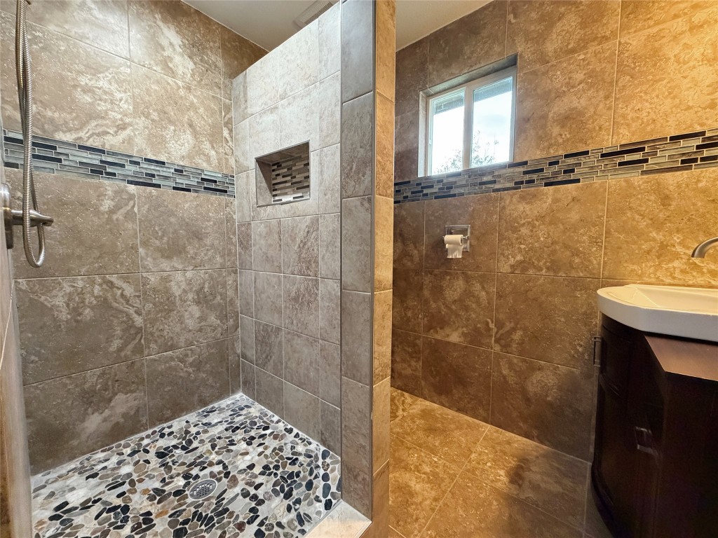 369 Road 3556 Cleveland, TX 77327 - Photo 11 of 16 a bathroom with a shower