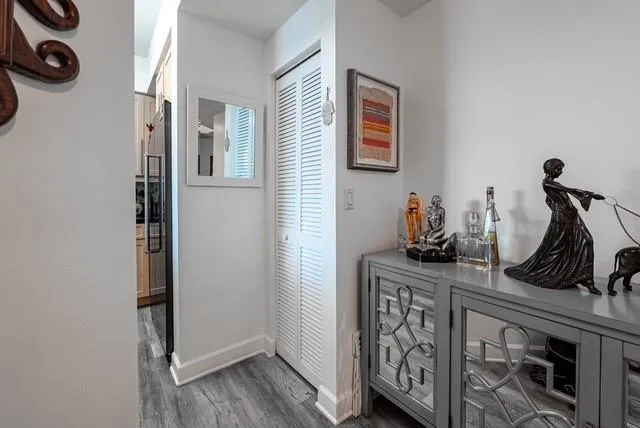 a room with furniture and wooden floor