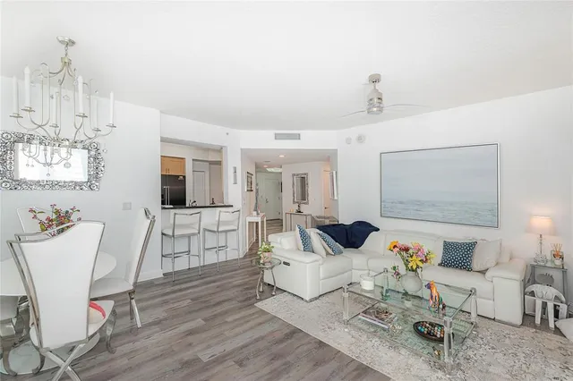 a spacious bedroom with a bed and a window