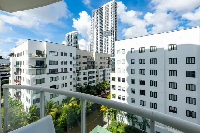 a view of balcony with patio